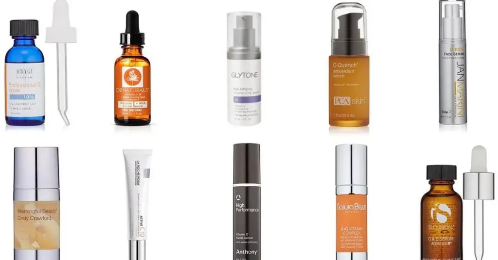 A collection of twelve different vitamin C serums displayed in two rows. The products come in various packaging styles including droppers, pump bottles, and tubes. Brands featured include Obagi OZ Naturals, Glytone, PCA Skin, Jan Marini, Meaningful Beauty, La Roche-Posay, Anthony, Natura Bissé, and SkinCeuticals.